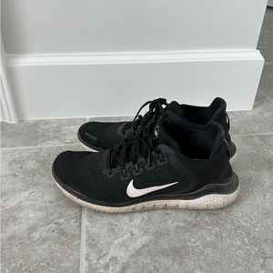 Nike Women’s Free Run Black and White Running Shoes.